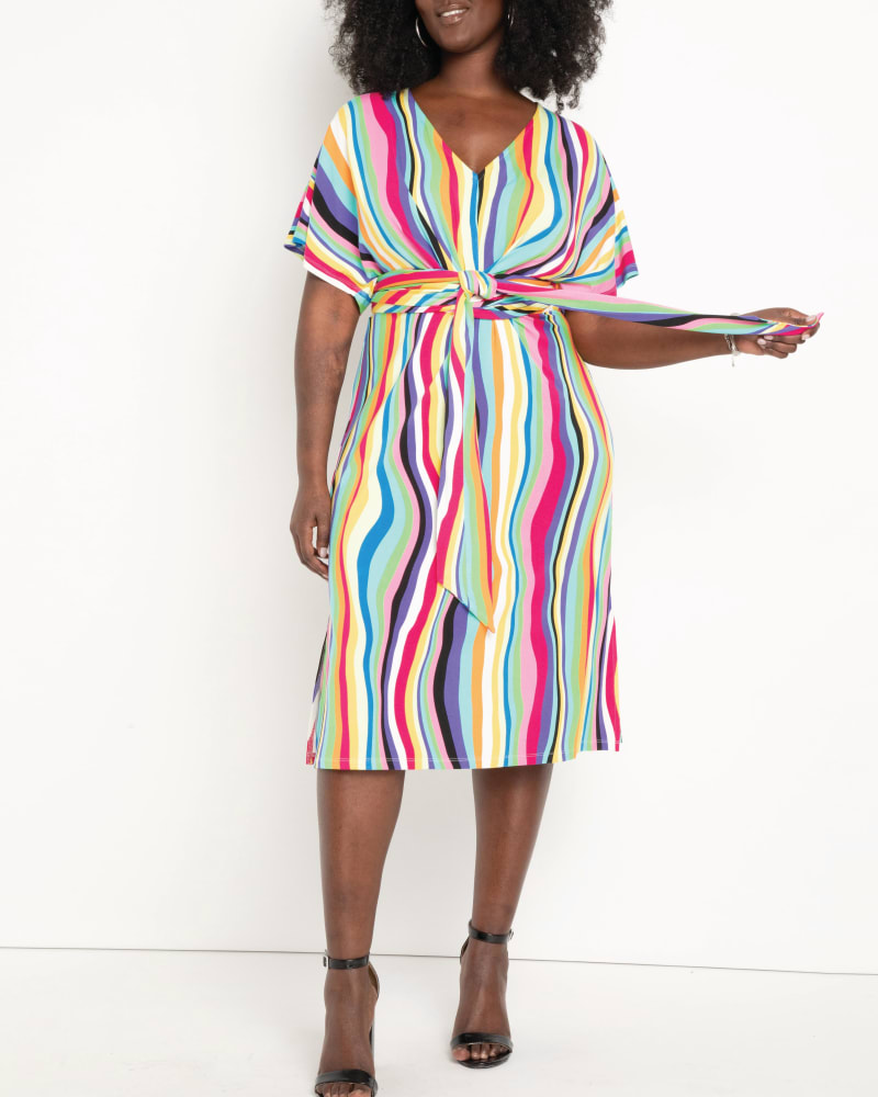Front of a model wearing a size 14 Tyra Striped Multi-Color Day Dress in Liquid Rainbow by ELOQUII. | dia_product_style_image_id:196193